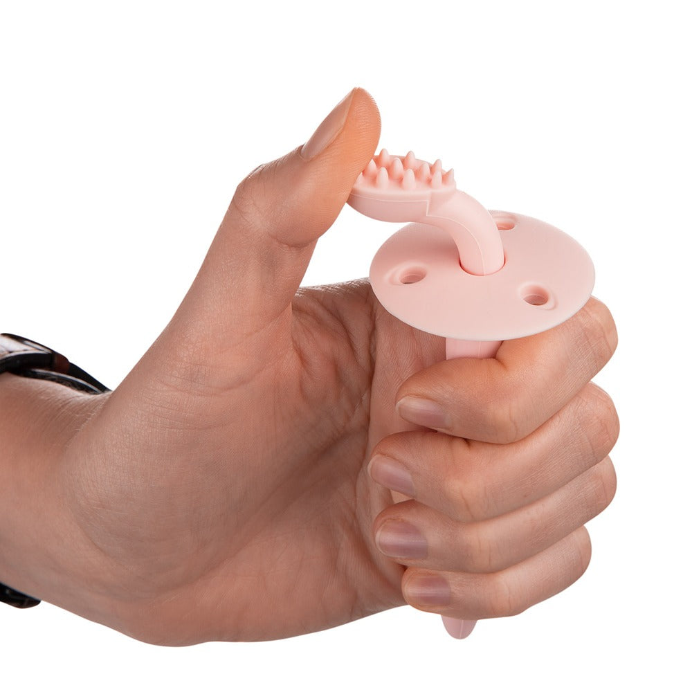 Cepillo de dientes de silicona con mordedor y protección para encías y primeros dientes, color rosa